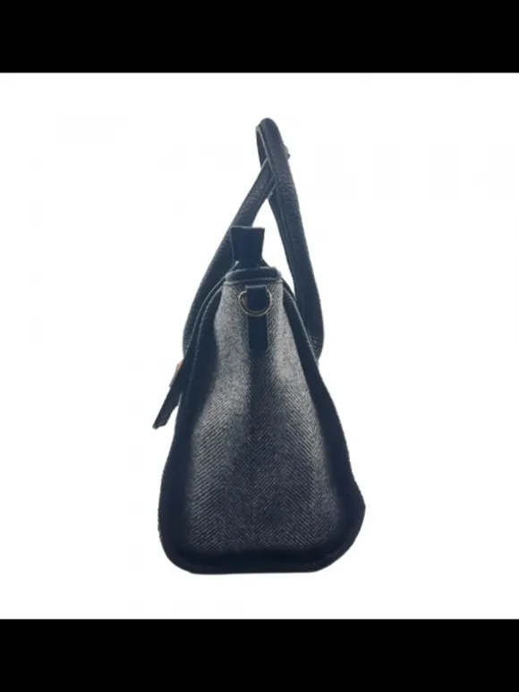 Black bag with imitation leather handles, spacious and elegant