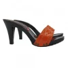 Women's clogs with orange patent leather band and black structure